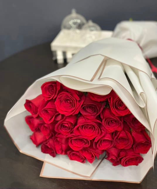 TWO DOZEN RED ROSES HAND-TIED BOUQUET
