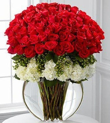 75 Red Roses with White Hydrangea in a sphere vase. 